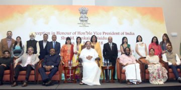The Vice President, Shri M. Venkaiah Naidu with a group of people, at the Community Reception, in Lima, Peru on May 11, 2018. The Minister of State for Tribal Affairs, Shri Jaswantsinh Sumanbhai Bhabhor and other dignitaries are also seen.