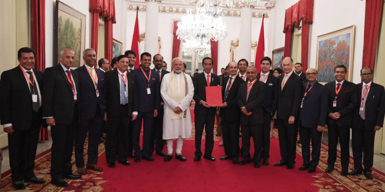 India - Indonesia CEOs Forum presenting report to the Prime Minister, Shri Narendra Modi and the President of Indonesia, Mr. Joko Widodo, in Jakarta, Indonesia on May 30, 2018.