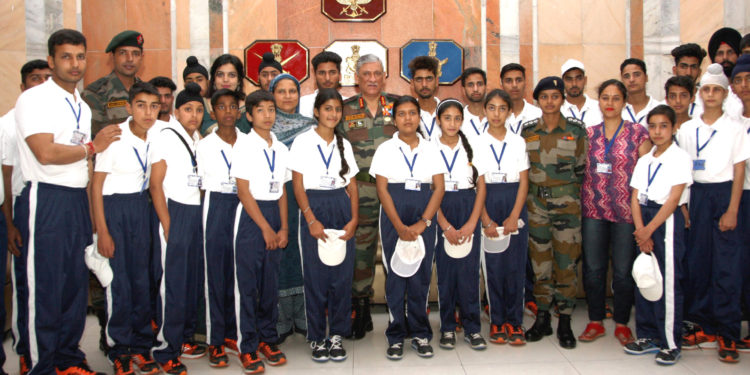 The Chief of Army Staff, General Bipin Rawat with the students and teachers from Jammu & Kashmir, in New Delhi on June 29, 2018.