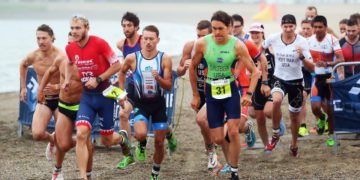 BOSTON, MA - JULY 22:  The elite athletes begin the Olympic race at Columbia Threadneedle Investments Boston Triathlon on July 22, 2018 in Boston, Massachusetts. (Photo by Adam Glanzman/Getty Images for Columbia Threadneedle Investments)