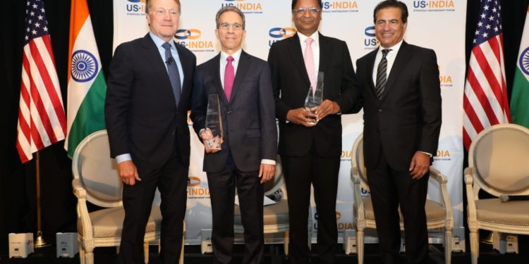 SpiceJet CMD Ajay Singh being awarded USISPF Leadership Award. | From left to right: John Chambers, Chairman of USISPF, Chairman Emeritus and Former CEO, Cisco; Jim Umpleby, CEO of Caterpillar; Ajay Singh, CMD, SpiceJet; Mukesh Aghi, President and CEO of USISPF.