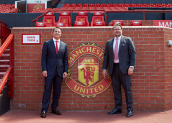 L-R Kohler CEO David Kohler MU Group MD Richard Arnold at Old Trafford (Photo: Business Wire)