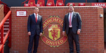 L-R Kohler CEO David Kohler MU Group MD Richard Arnold at Old Trafford (Photo: Business Wire)