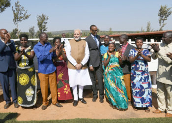 The Prime Minister,  Narendra Modi participating in the Girinka (one cow per poor family programme), during his visit to Rweru Model village, in Rwanda on July 24, 2018.
	The President of Rwanda, Mr. Paul Kagame is also seen.