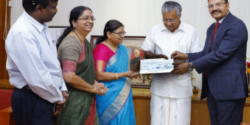 T N Manoharan, Chairman of our bank, Smt. P V Bharathi, Executive Director of our bank and Smt. G K Maya, General Manager, Trivandrum Circle Office donating the DD of  Rs.5.01 Cr towards Kerala Chief Minister’s Disaster Relief Fund to Pinarayi Vijayan, Chief Minister of Kerala.