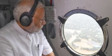 The Prime Minister, Narendra Modi conducting an aerial survey of flood affected areas, in Kerala on August 18, 2018.