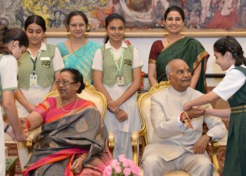 The President, Ram Nath Kovind being tied a Rakhi by a student, on the occasion of Raksha Bandhan, at Rashtrapati Bhavan, in New Delhi on August 26, 2018.