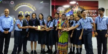 Chairman and Managing Director of Narayana Nethralaya, Dr. Bhujang Shetty along with the students and staff of Sri Vani School who won the prize in puppet show on eye donation commemorating the 33rd National Eye Donation Fortnight at Narayana Nethralaya.