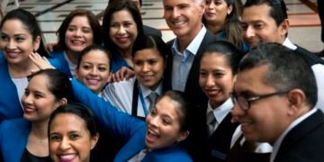 Hilton President & CEO Chris Nassetta with Team Members. (Photo: Business Wire)