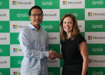 Ming Maa, president of Grab (left), with Peggy Johnson, Executive Vice President of Business Development, Microsoft.