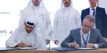 (Left to right) Dr. Fahad Mushayt, CEO, STC Specialized; and Amr K. El Leithy, Head of the MEA market, Nokia, sign MoU. In the background (left to right) Dr. Tarig Enaya, Senior VP of Enterprise Business Unit at STC; Waseem Al-Marzogi, Head of the STC customer business team at Nokia; and Bernard Najm, Head of the Middle East Market Unit, Nokia.