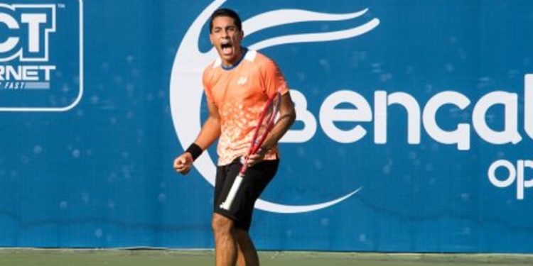Youssef Hossam exults after winning a point against top seed Albot Radu in the first round of the Bengaluru Open ATP Challenger tennis tournament at the KSLTA on Tuesday.