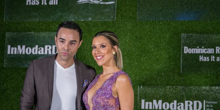 CNN en Español Journalist Erick Cuesta and TV Host Stephanie Carrillo enter the first annual InModaRD fashion show in Miami hosted by the Dominican Republic Ministry of Tourism.