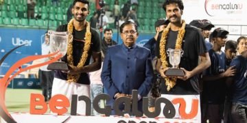 Champion Prajnesh Gunneswaran (left) and runner-up Saketh Myneni strike a pose with the Deputy Chief Minister of Karnataka Dr. G Parameshwara during the prize presentation of the Bengaluru Open ATP Challenger at the KSLTA on Saturday. Pic credit Deepthi Indukuri