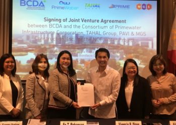 From left to right: Prime Water's Ms. Ma. Fiorella Fabella; Prime Water's Ms. Ma. Gemma Aspiras; Prime Water's Ms. Fe Robancos; BCDA President Mr. Vivencio Dizon; BCDA Executive Vice President Ms. Aileen Zosa; and BCDA Vice President of Finance Ms. Nena Radoc.