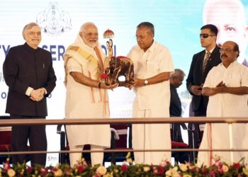 The Prime Minister,  Narendra Modi at the inauguration of the Kollam Bypass on NH 66, in Kerala on January 15, 2019. The Governor of Kerala, Justice (Retd.) P. Sathasivam and the Chief Minister of Kerala,  Pinarayi Vijayan are also seen.