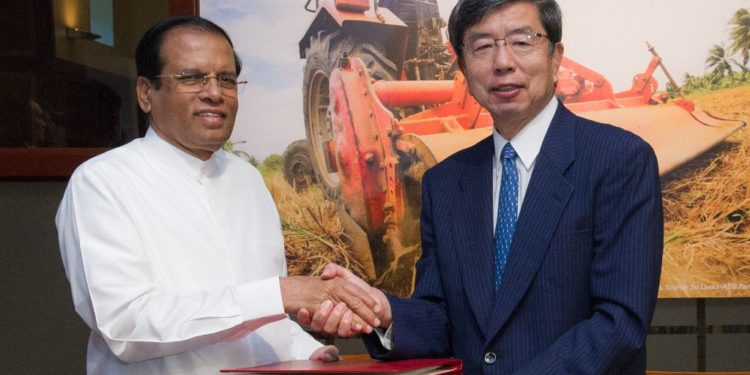 Sri Lanka’s President Mr. Maithripala Sirisena (left) and ADB President Mr. Takehiko Nakao (right) after signing three loan agreements totaling $455 million at ADB headquarters.
