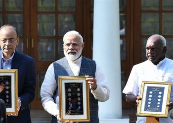 The Prime Minister, Narendra Modi releasing the new series of visually impaired friendly circulation coins, at a function, at 7 Lok Kalyan Marg, New Delhi on March 07, 2019. The Union Minister for Finance and Corporate Affairs, Arun Jaitley and the Minister of State for Finance and Shipping, P. Radhakrishnan are also seen.