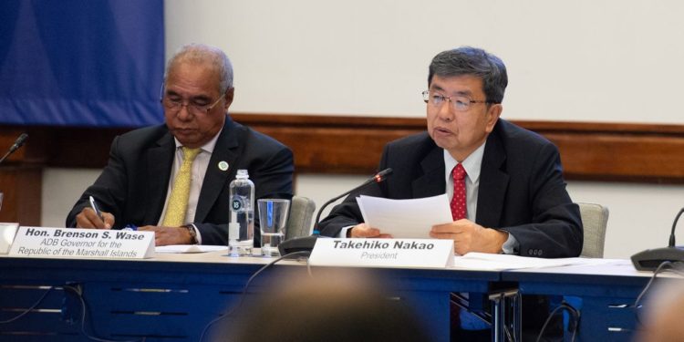 ADB President Mr. Takehiko Nakao (right) addresses Pacific Developing Member Country Governors on 1 May 2019 at the 52nd Annual Meeting in Nadi, Fiji. The Republic of the Marshall Islands Minister of Finance, Banking, and Postal Services Mr. Brenson S. Wase (left) co-chaired the meeting.