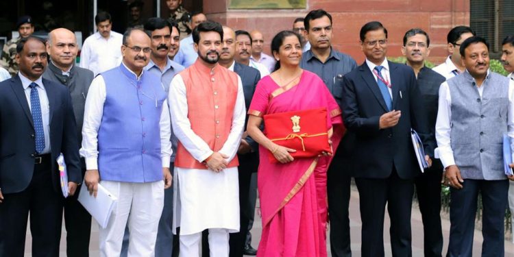 The Union Minister for Finance and Corporate Affairs, Smt. Nirmala Sitharaman departs from North Block to Rashtrapati Bhavan and Parliament House, along with the Minister of State for Finance and Corporate Affairs, Anurag Singh Thakur and the senior officials to present the General Budget 2019-20, in New Delhi on July 05, 2019.