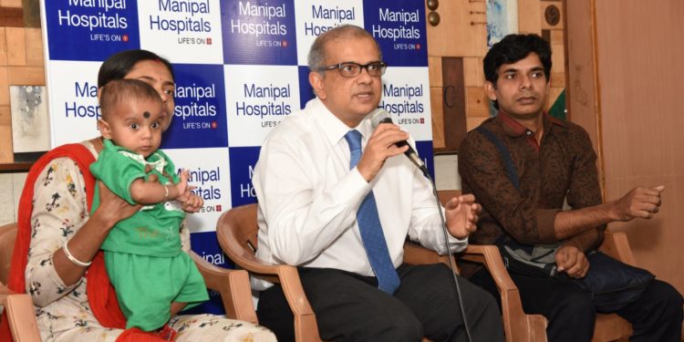 Dr. Radhakrishna, HOD & Consultant, Pediatric Surgeon & Urologist, Manipal Hospitals , Manipal Pediatrics clinic Kormangala along with Mr. Tanmoy Mondal & Mrs. Bijiya Mondal and Master Abhir Mondal