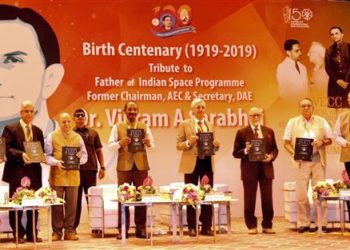 The Chairman, Indian Space Research Organisation (ISRO), Dr. K. Sivan along with other dignitaries releasing the coffee table book on ISRO through pictures, during the inaugural function of birth centenary celebration of Dr. Vikram Sarabhai, at Gujarat University Convention & Exhibition Center, in Ahmedabad on August 12, 2019.