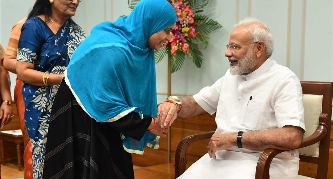 Women tying ‘Rakhi’ on the wrist of the Prime Minister,  Narendra Modi, on the occasion of ‘Raksha Bandhan’, in New Delhi on August 15, 2019.