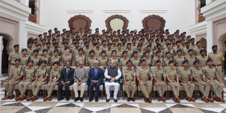 The Union Home Minister,  Amit Shah in a group photograph with the Probationers of 2018 Batch of Indian Police Service (IPS), in New Delhi on October 07, 2019. The Union Home Secretary, Ajay Kumar Bhalla is also seen.