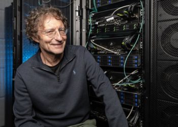 Habana Labs chairman Avigdor Willenz stands near a rack that incorporates Habana Labs' HLS-1 Gaudi artificial intelligence training system at Habana Labs' office in Caesarea, Israel. Willenz will serve as a senior adviser to the business unit as well as to Intel Corporation after Intel's purchase of Habana. (Credit: Eyal Toueg/Intel Corporation)