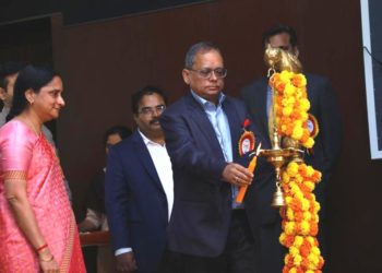 Mr Deepak Kumar Hota, CMD, BEML, lighting the lamp at the inaugural of the Roadshow for DefExpo India-2020, as Mrs Anandi Ramalingam, Director (Marketing), BEL, looks on.