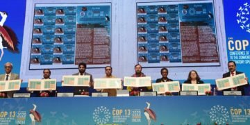The Union Minister for Environment, Forest & Climate Change, Information & Broadcasting and Heavy Industries and Public Enterprise, Prakash Javadekar and the Chief Minister of Gujarat, Vijay Rupani releasing the postal stamp at the inaugural session of the 13th Conference of the Parties to the Convention on Migratory Species “CMS COP13”, in Gandhinagar, Gujarat on February 17, 2020. The Minister of State for Environment, Forest and Climate Change, Babul Supriyo and other dignitaries are also seen.