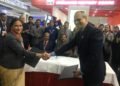 Mrs Anandi Ramalingam, Director (Marketing), BEL, and Mr E R Sheikh, Sr DDG, OFB, exchanging the MoU documents in the presence of Shri Shripad Yesso Naik, Hon’ble Raskha Rajya Mantri, Mr Hari Mohan, DGOF & Chairman, OFB, and Mr Gowtama M V, CMD, BEL.