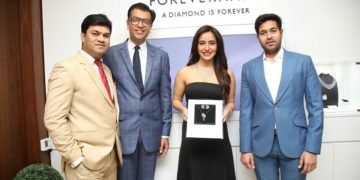 (L-R) Mr. Amit Bandi, CEO, DP Abhushan Ltd, Mr. Sachin Jain, President, Forevermark India, Actress Neha Sharma and Mr. Vikas Kataria, Managing Director, DP Abhushan Ltd.