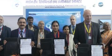 (Left-Right) Cmde S Nayyar (IN Retd), Director (Ship Building), GRSE, Mrs Anandi Ramalingam, Director (Marketing), BEL, and Mr Yaron Levi, Vice President (Naval Systems), Elbit Systems, display the tripartite MoU signed between BEL, GRSE and Elbit Systems.
