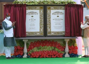 The Prime Minister  Narendra Modi unveiling the plaque to lay the foundation stone of the New Parliament Building, at Sansad Marg, in New Delhi on December 10, 2020. The Speaker, Lok Sabha, Om Birla, the Union Minister for Parliamentary Affairs, Coal and Mines, Pralhad Joshi and the Minister of State for Housing & Urban Affairs, Civil Aviation (Independent Charge) and Commerce & Industry, Hardeep Singh Puri are also seen.