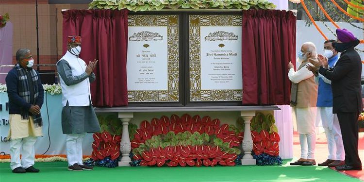 The Prime Minister  Narendra Modi unveiling the plaque to lay the foundation stone of the New Parliament Building, at Sansad Marg, in New Delhi on December 10, 2020. The Speaker, Lok Sabha, Om Birla, the Union Minister for Parliamentary Affairs, Coal and Mines, Pralhad Joshi and the Minister of State for Housing & Urban Affairs, Civil Aviation (Independent Charge) and Commerce & Industry, Hardeep Singh Puri are also seen.