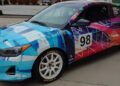 The No. 98 Hyundai Veloster N Turbo TCA race car, with livery by artist Vy Ngo at Bryan Herta Autosport in Indianapolis, Nov. 30, 2021. (Photo/Bryan Herta Autosport)