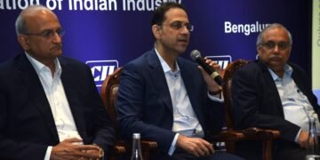 (L-R) Mr R Dinesh, President - Designate, CII; Mr Sanjiv Bajaj, Mr Sanjiv Bajaj, Chairman and Managing Director, Bajaj Finserv Limited & President, CII; Mr Chandrajit Banerjee, Director General, CII.jpg