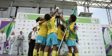 Team Brazil girls lift the winner’s trophy at the Street Child World Cup 2018, Moscow