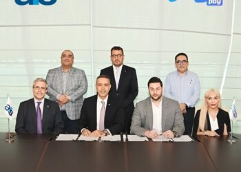 CEOs of Jingle Pay and AFS signing the strategic partnership