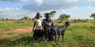 Eli and his daughter, Alice, in the Karamoja region of Uganda.