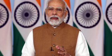 PM addressing the gathering at the dedication of the 75 Digital Banking Units across 75 districts to the Nation, via video conferencing, in New Delhi on October 16, 2022.