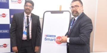 (Left) Mr N Premanand, Senior Vice President, Retail Branch Banking, HDFC Bank and (Right) Mr.Ganesh Devarajan, Senior Vice President, Retail Branch Banking, HDFC Bank launch SmartHub Vyapar, a one-stop merchant solution app for all banking and business solutions, in Bengaluru.
