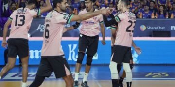 Pankaj Sharma, Captain of Bengaluru Torpedoes (second from left), celebrates after winning a point along with other members of the team.