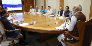 PM chairs a high-level meeting to review status and preparedness of public health response to Covid-19 & Influenza, in New Delhi on March 22, 2023.