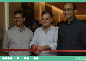 Chaitanya Gorrepati, Charitra Mehta, and Lakshmi Prasad Koneti (L-R), members of the Operating Committee (OC) at D. E. Shaw India celebrating the firm’s new offices.