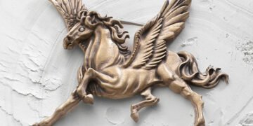 Pegasus Brass Horse Brooch (PRNewsfoto/Ferns N Petals)