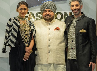 Mrunal Thakur and Jim Sarbh with designer JJ Valaya at the Blenders Pride Glassware Fashion NXT preview in Hyderabad