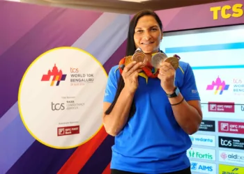 TCS World 10K Bengaluru 2024 Intl. Event Ambassador, two-time Olympic & four-time Shot Put World Champion Valerie Adams at Vidhana Soudha & at the event Media center with her Olympic Medals.