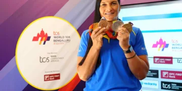 TCS World 10K Bengaluru 2024 Intl. Event Ambassador, two-time Olympic & four-time Shot Put World Champion Valerie Adams at Vidhana Soudha & at the event Media center with her Olympic Medals.